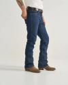 A person wearing a white t-shirt, blue jeans, a brown belt, and brown cowboy boots stands against a plain background.